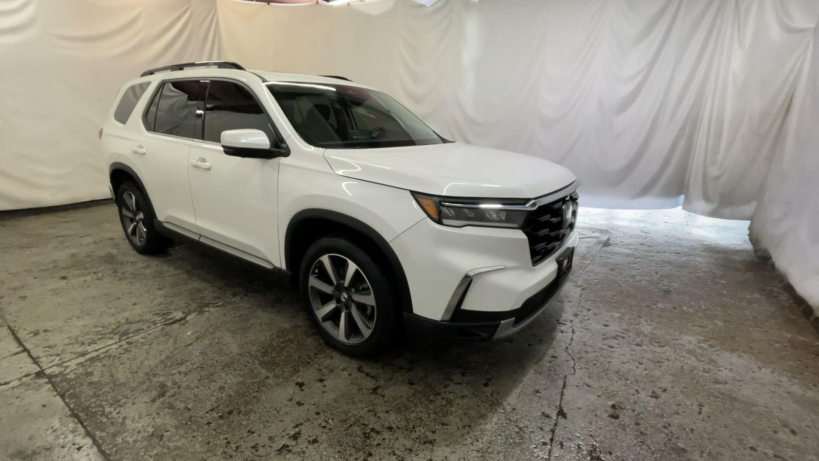 2025 Honda Pilot Elite - Platinum White Pearl exterior view 2