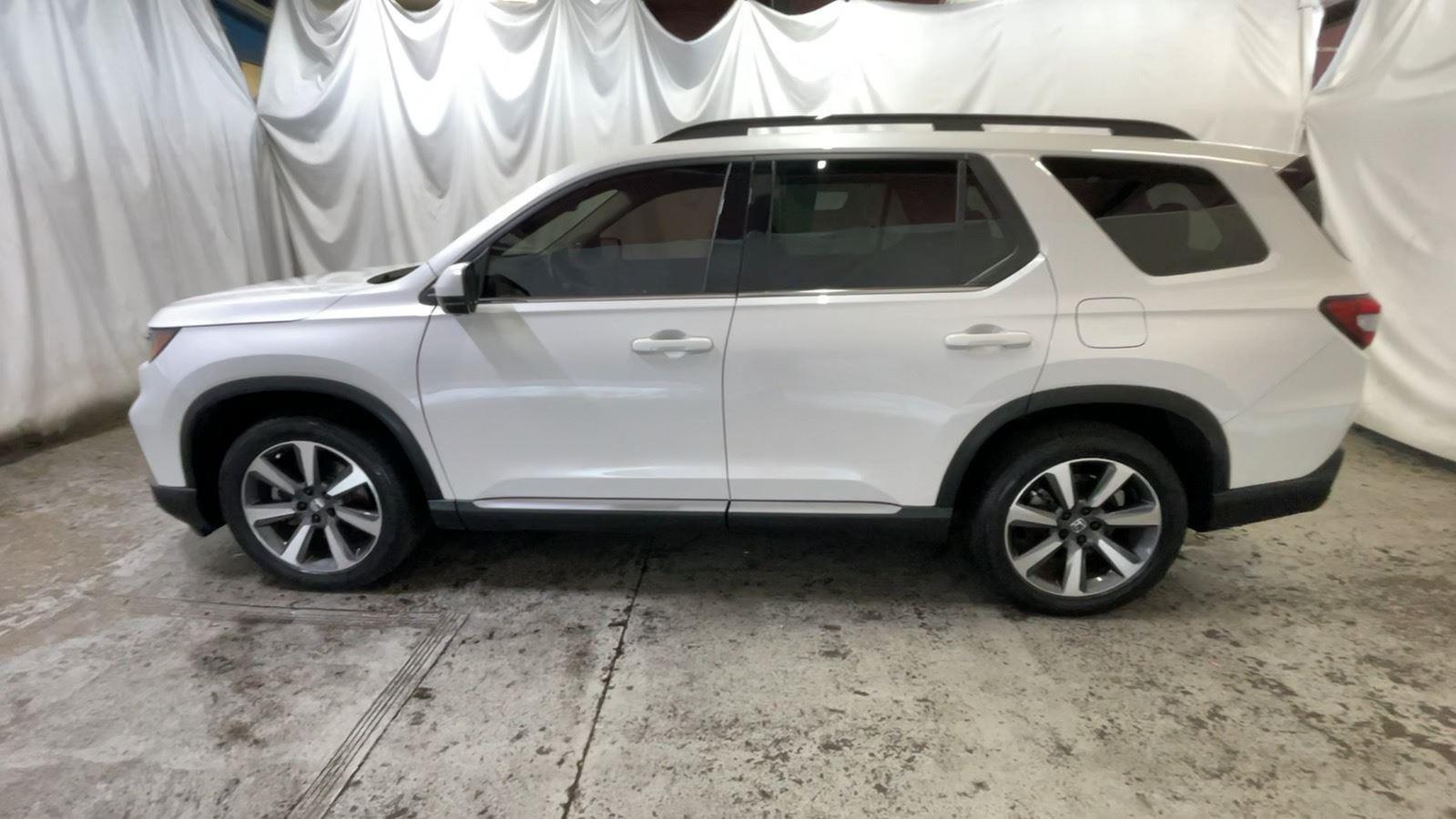 2025 Honda Pilot Elite - Platinum White Pearl exterior view 10