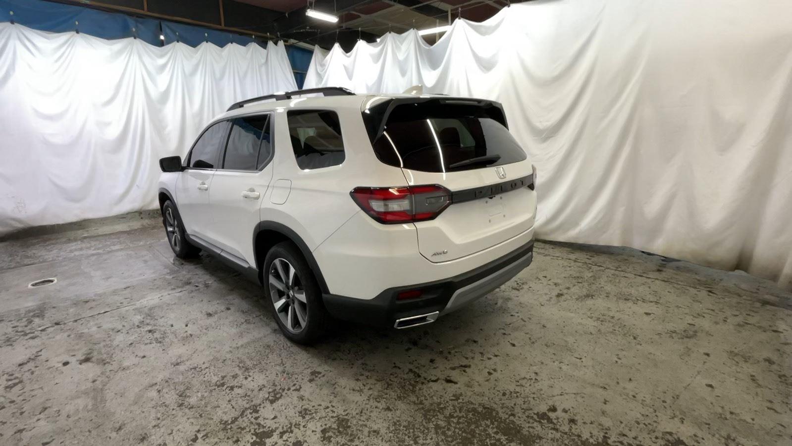 2025 Honda Pilot Elite - Platinum White Pearl exterior view 7