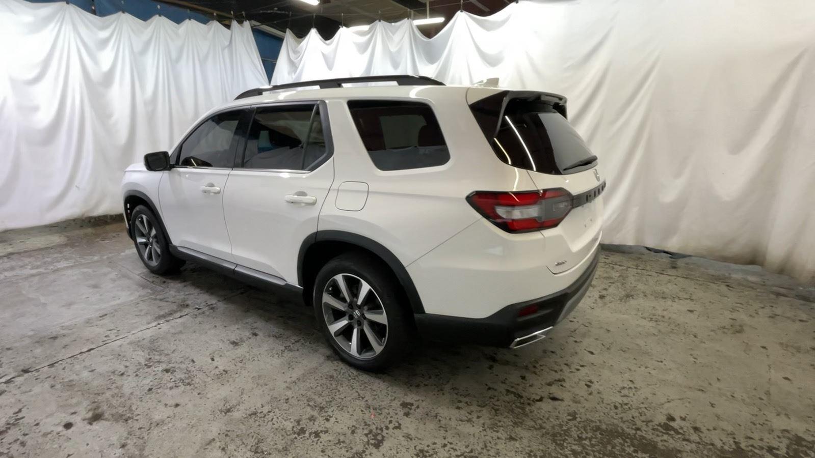 2025 Honda Pilot Elite - Platinum White Pearl exterior view 8