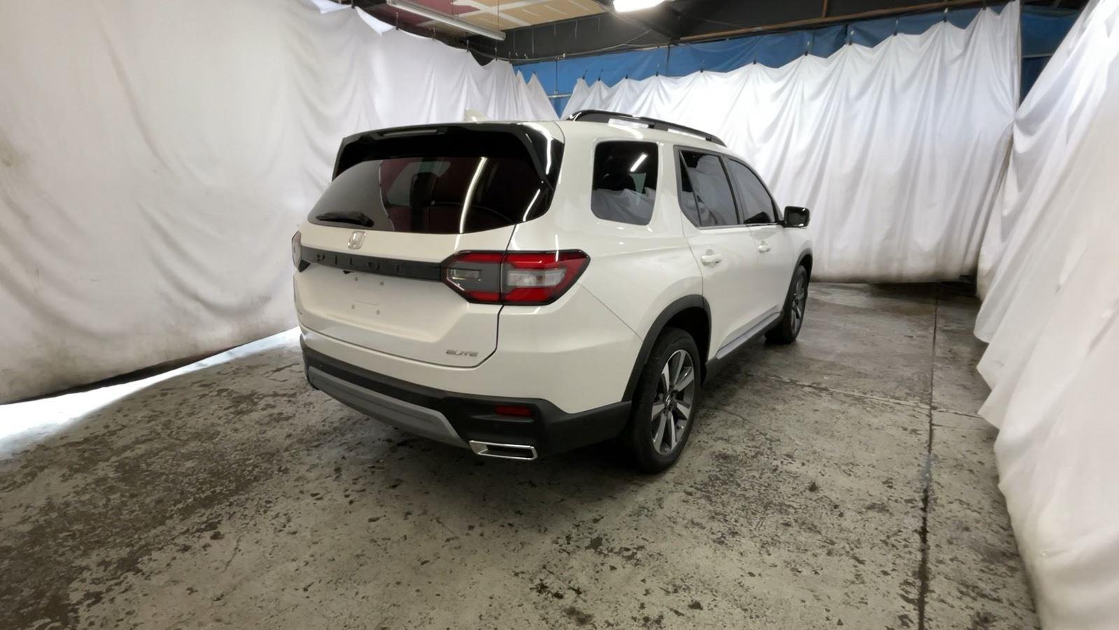 2025 Honda Pilot Elite - Platinum White Pearl exterior view 5