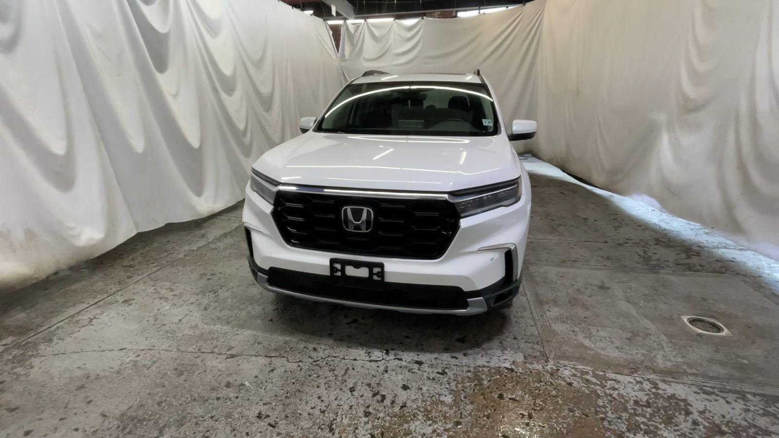 2025 Honda Pilot Elite - Platinum White Pearl exterior view 12