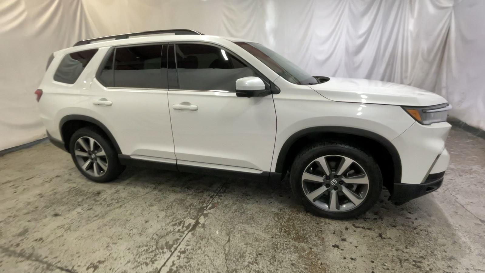2025 Honda Pilot Elite - Platinum White Pearl exterior view 3