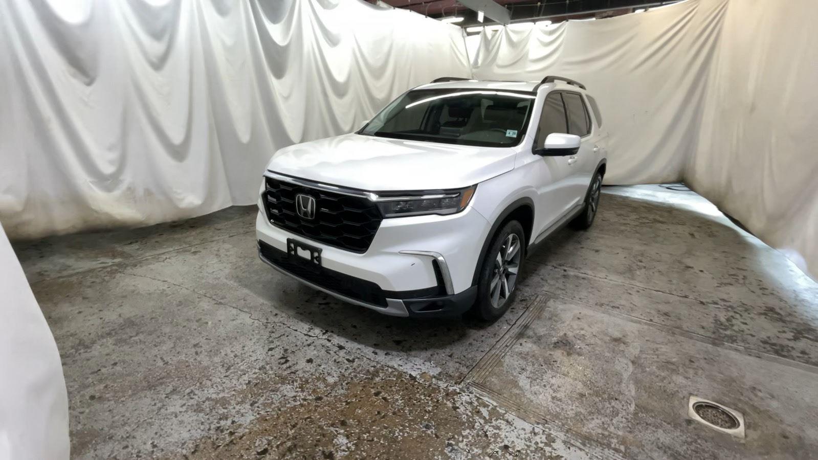 2025 Honda Pilot Elite - Platinum White Pearl exterior view 11