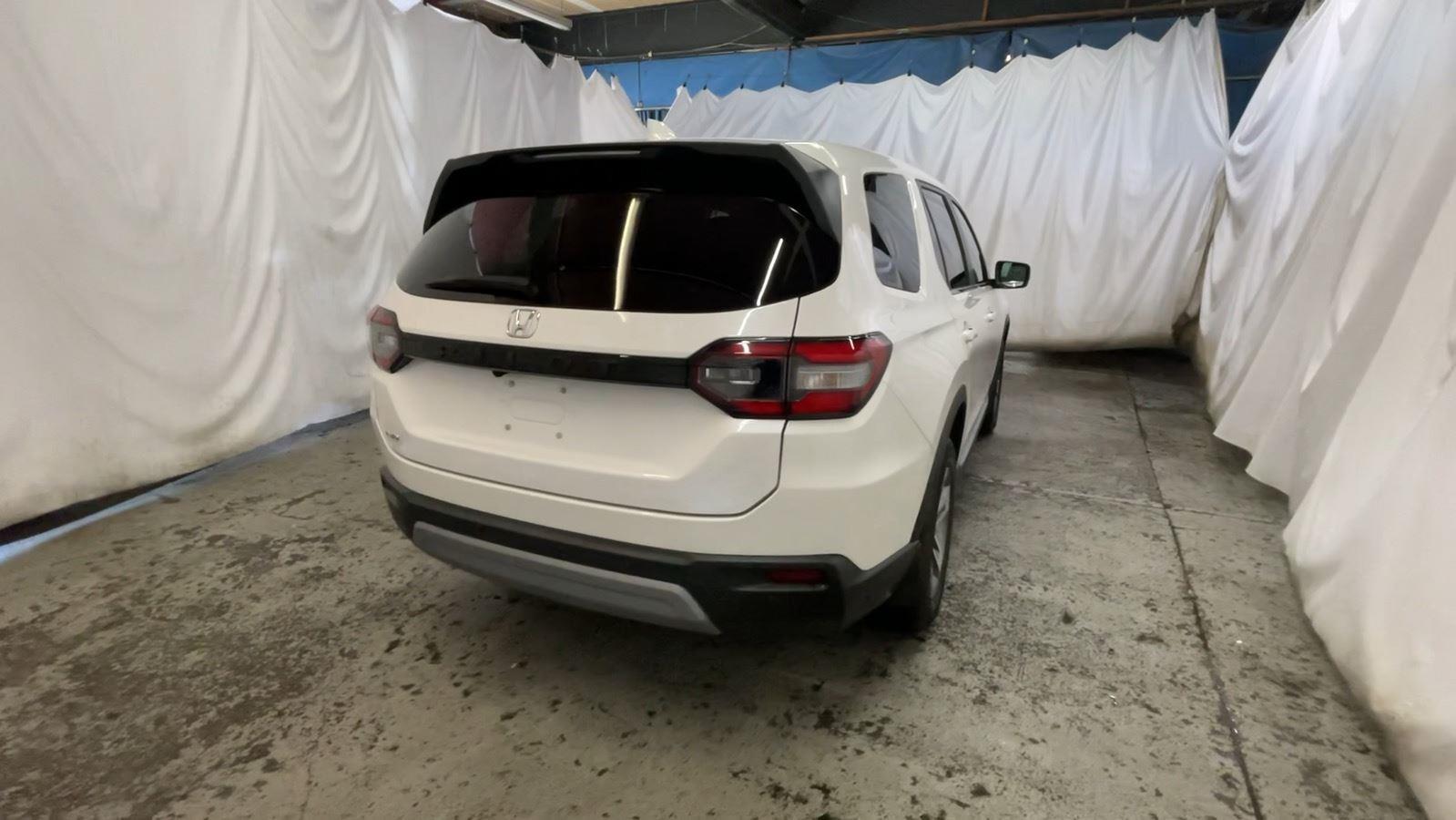2023 Honda Pilot EX-L 7 Passenger - Platinum White Pearl exterior view 6