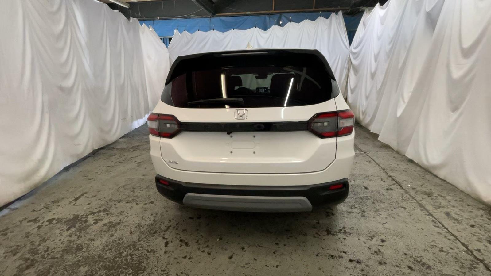 2023 Honda Pilot EX-L 7 Passenger - Platinum White Pearl exterior view 7