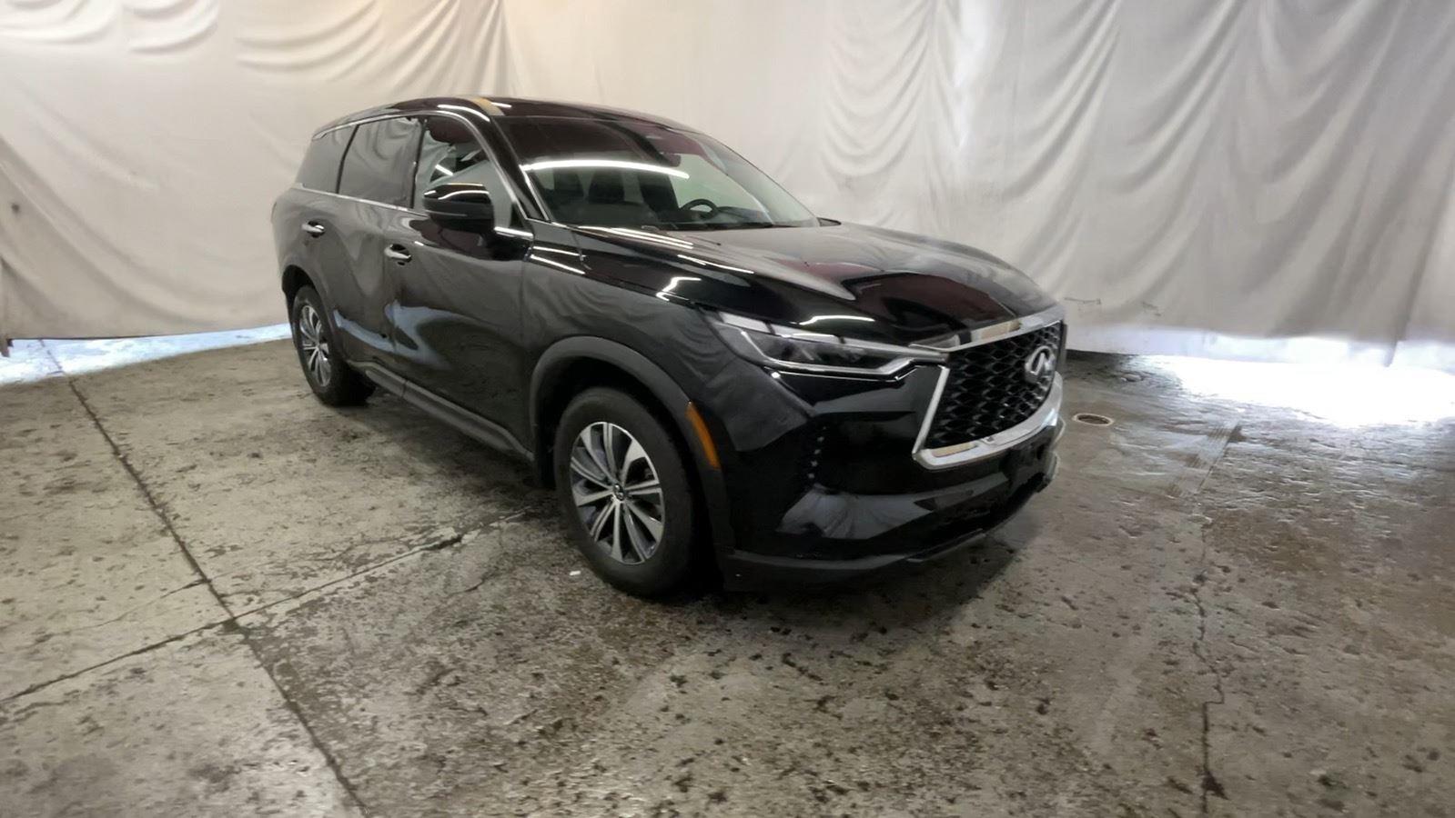 2025 INFINITI QX60 PURE - Mineral Black exterior view 2