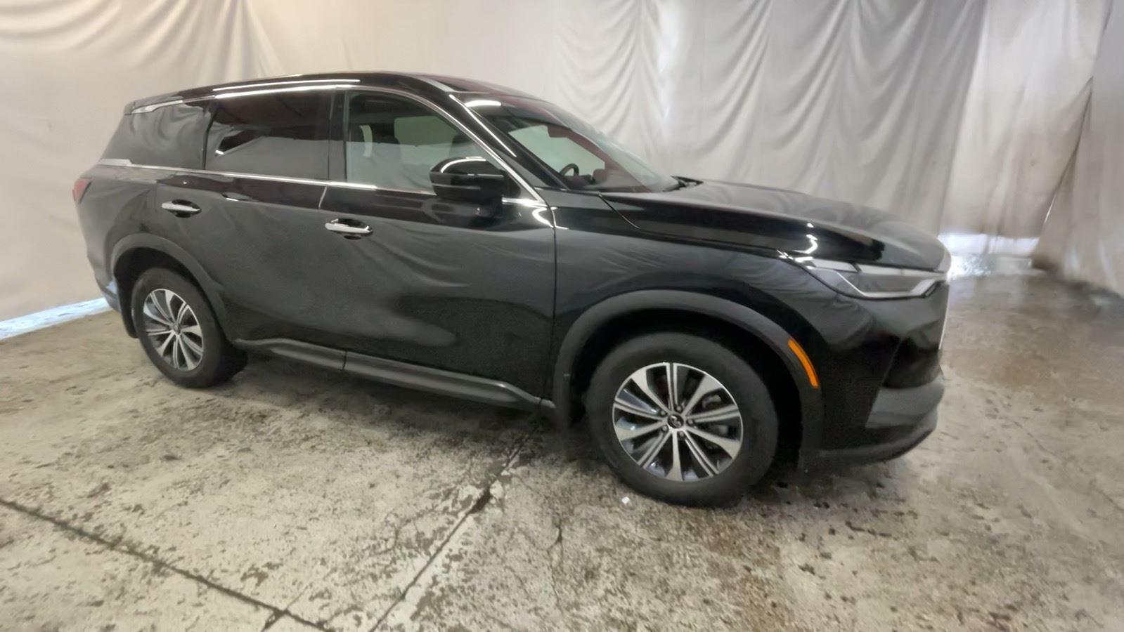 2025 INFINITI QX60 PURE - Mineral Black exterior view 3
