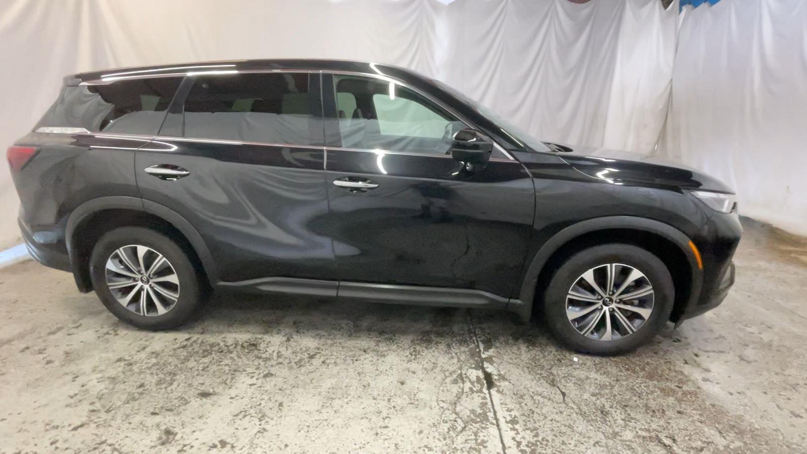 2025 INFINITI QX60 PURE - Mineral Black exterior view 4
