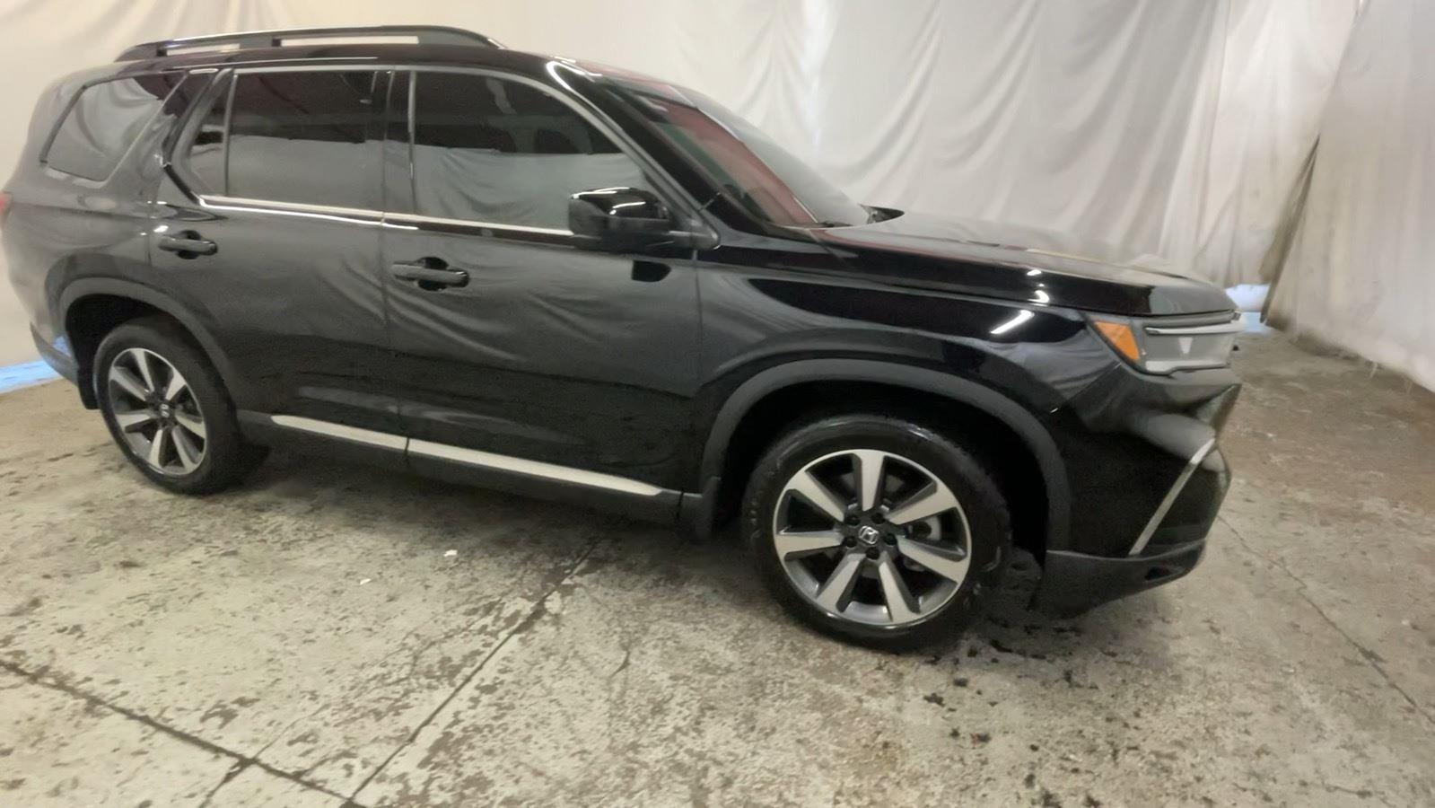 2024 Honda Pilot Elite - Crystal Black Pearl exterior view 3