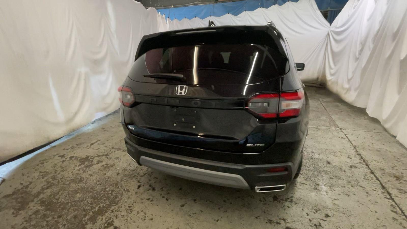 2024 Honda Pilot Elite - Crystal Black Pearl exterior view 6