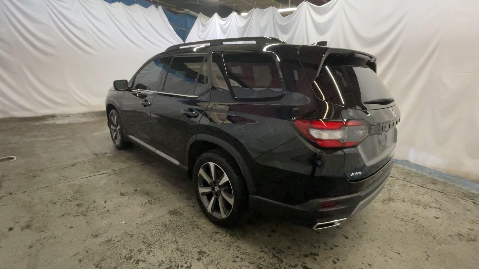 2024 Honda Pilot Elite - Crystal Black Pearl exterior view 8