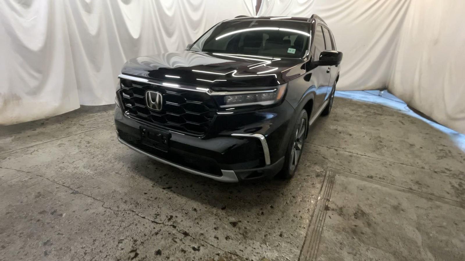 2024 Honda Pilot Elite - Crystal Black Pearl exterior view 12