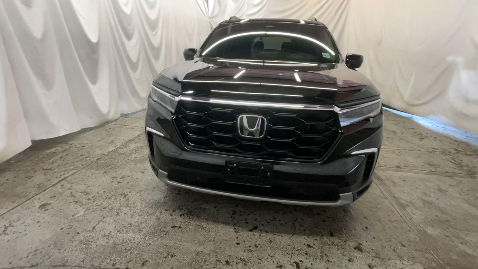2024 Honda Pilot Elite - Crystal Black Pearl exterior view 13