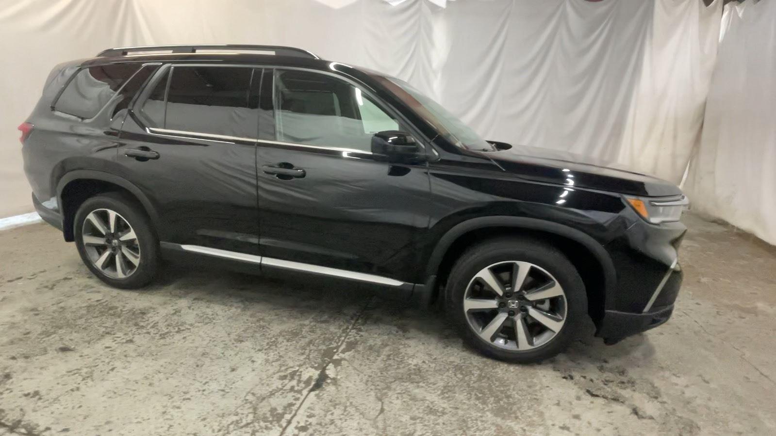 2025 Honda Pilot Elite - Crystal Black Pearl exterior view 4