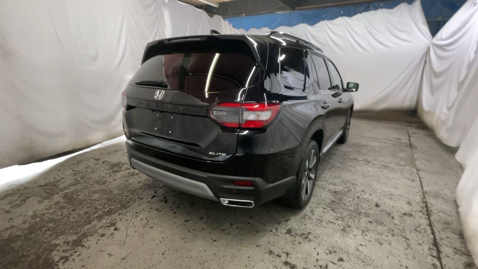 2025 Honda Pilot Elite - Crystal Black Pearl exterior view 6