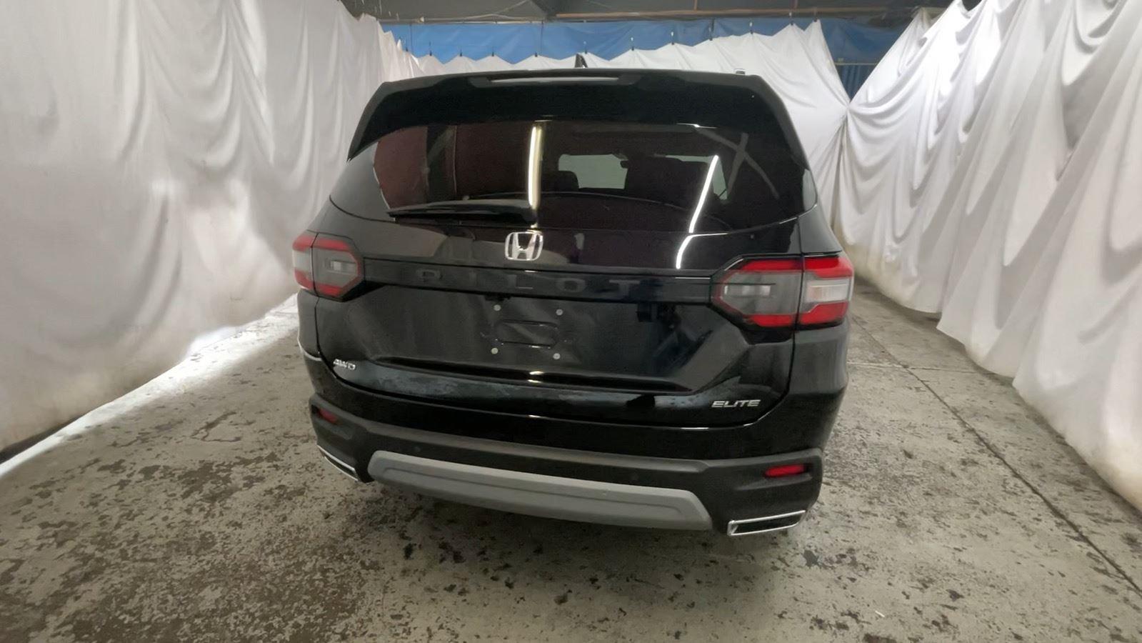 2025 Honda Pilot Elite - Crystal Black Pearl exterior view 7