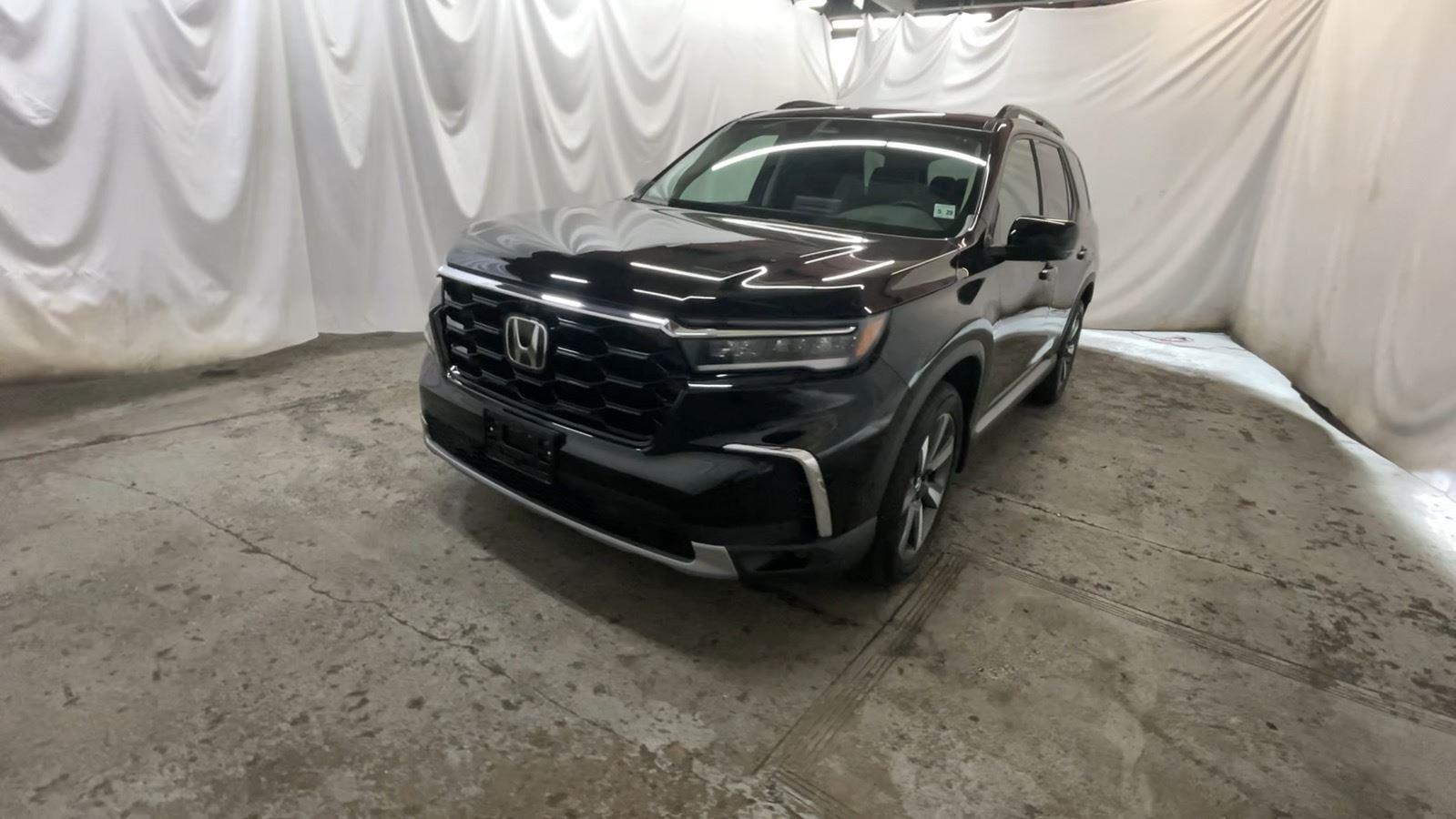 2025 Honda Pilot Elite - Crystal Black Pearl exterior view 13