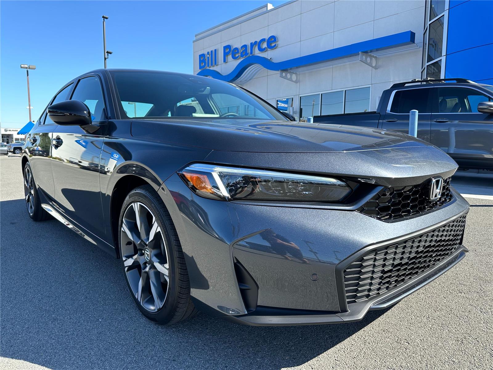 2026 Honda Civic Sport Touring Hybrid CVT's photo