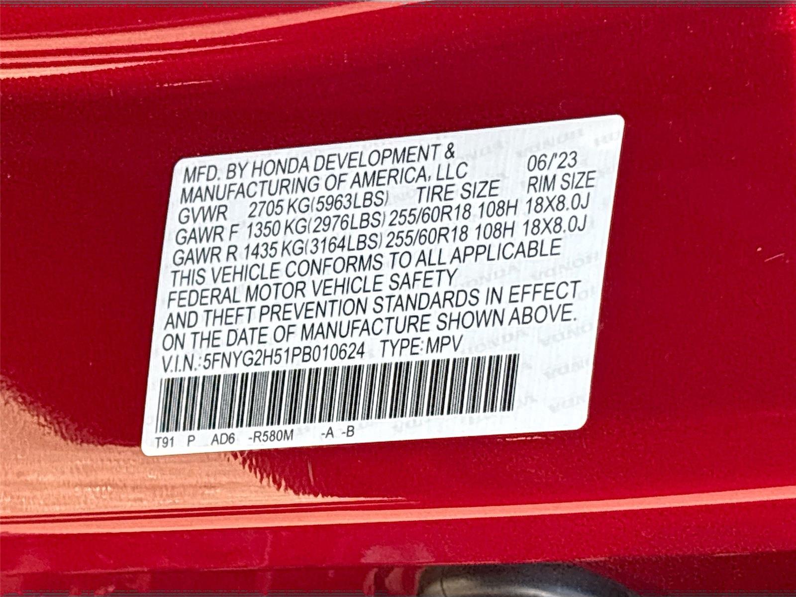 2023 Honda Pilot EX-L w/Rear Captain’s Chairs