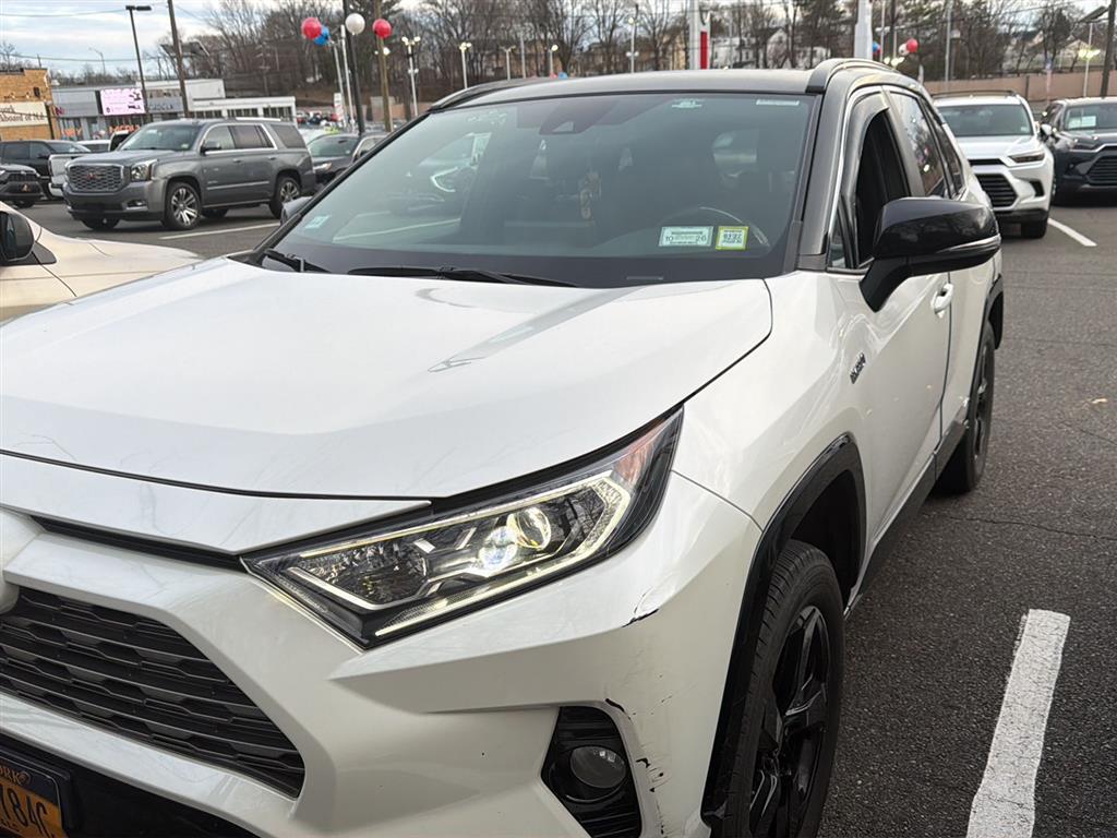 Blizzard Pearl/Midnight Black Metallic 2021 Toyota RAV4 Hybrid XSE AWD SUV / Crossover All-Wheel Drive Continuously Variable Transmission