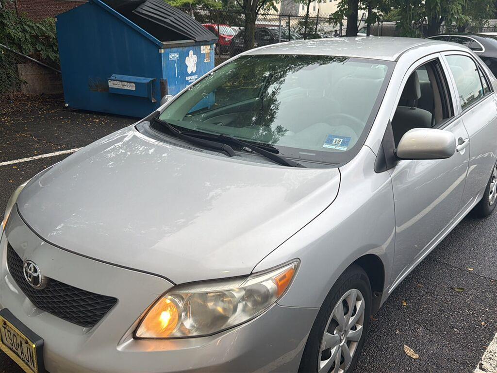 Classic Silver Metallic 2010 Toyota Corolla Sedan Front-Wheel Drive Automatic