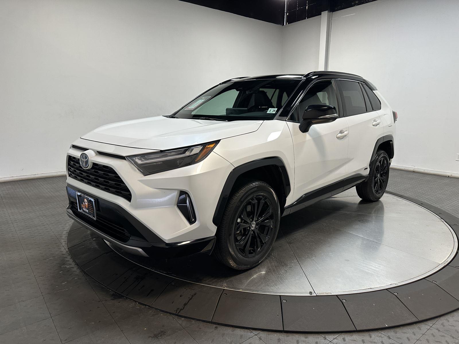 Wind Chill Pearl/Midnight Black Metallic 2023 Toyota RAV4 Hybrid XSE AWD SUV / Crossover All-Wheel Drive Continuously Variable Transmission