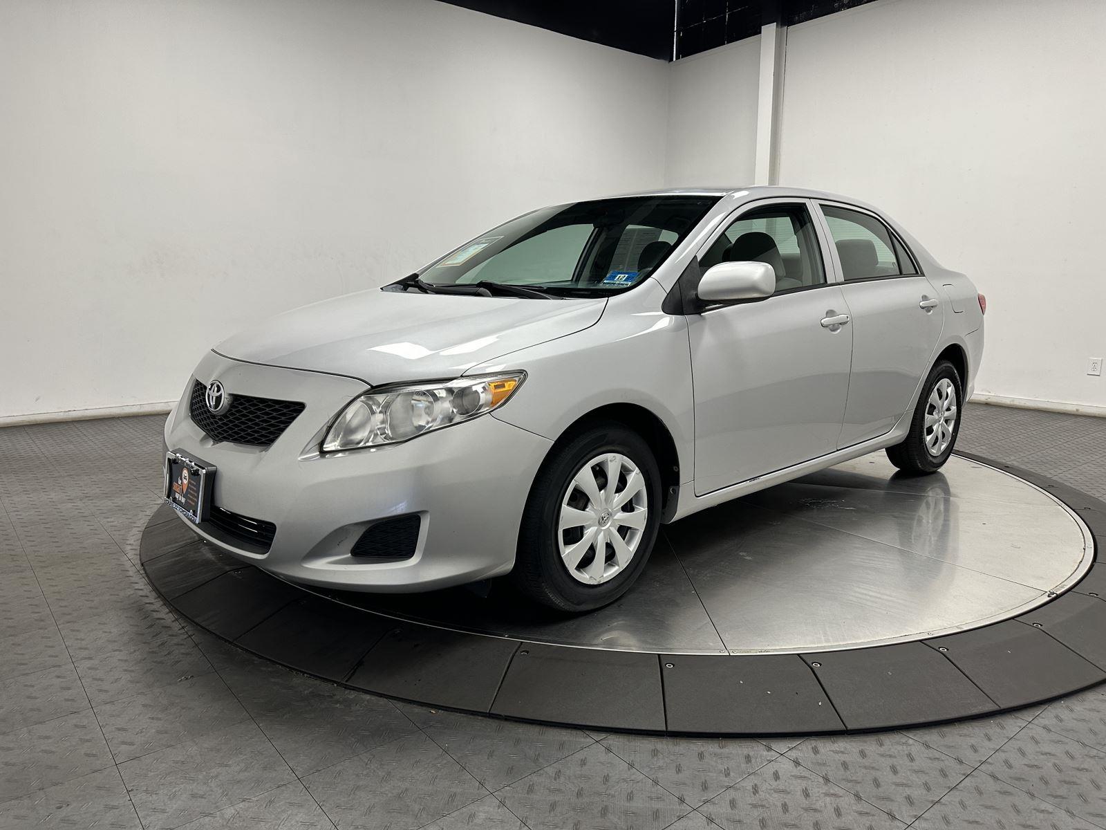 Classic Silver Metallic 2010 Toyota Corolla Sedan Front-Wheel Drive Automatic