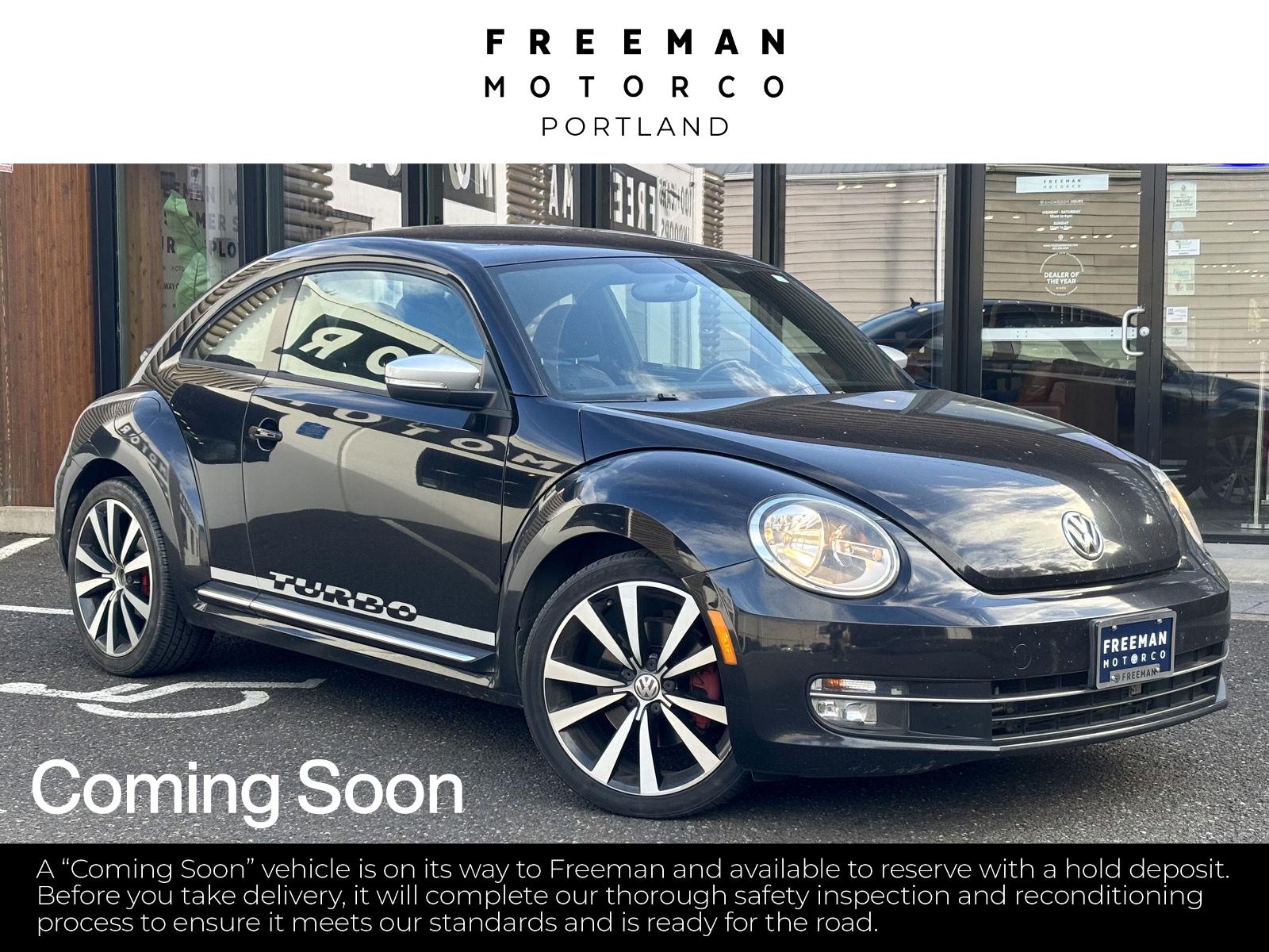 Deep Black Pearl Metallic 2012 Volkswagen Beetle Hatchback Front-Wheel Drive Automatic