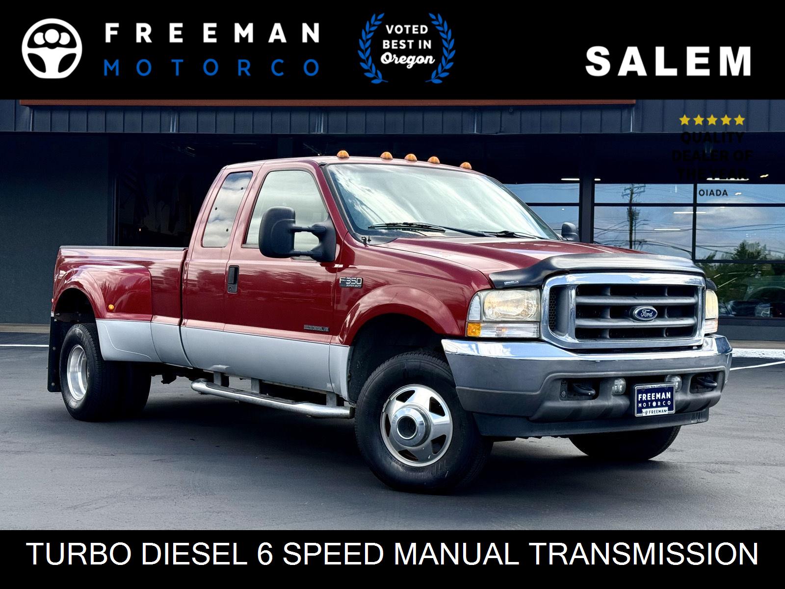 Red 2002 Ford F-350 Super Duty Pickup Truck Four-Wheel Drive 6-Speed Manual Overdrive
