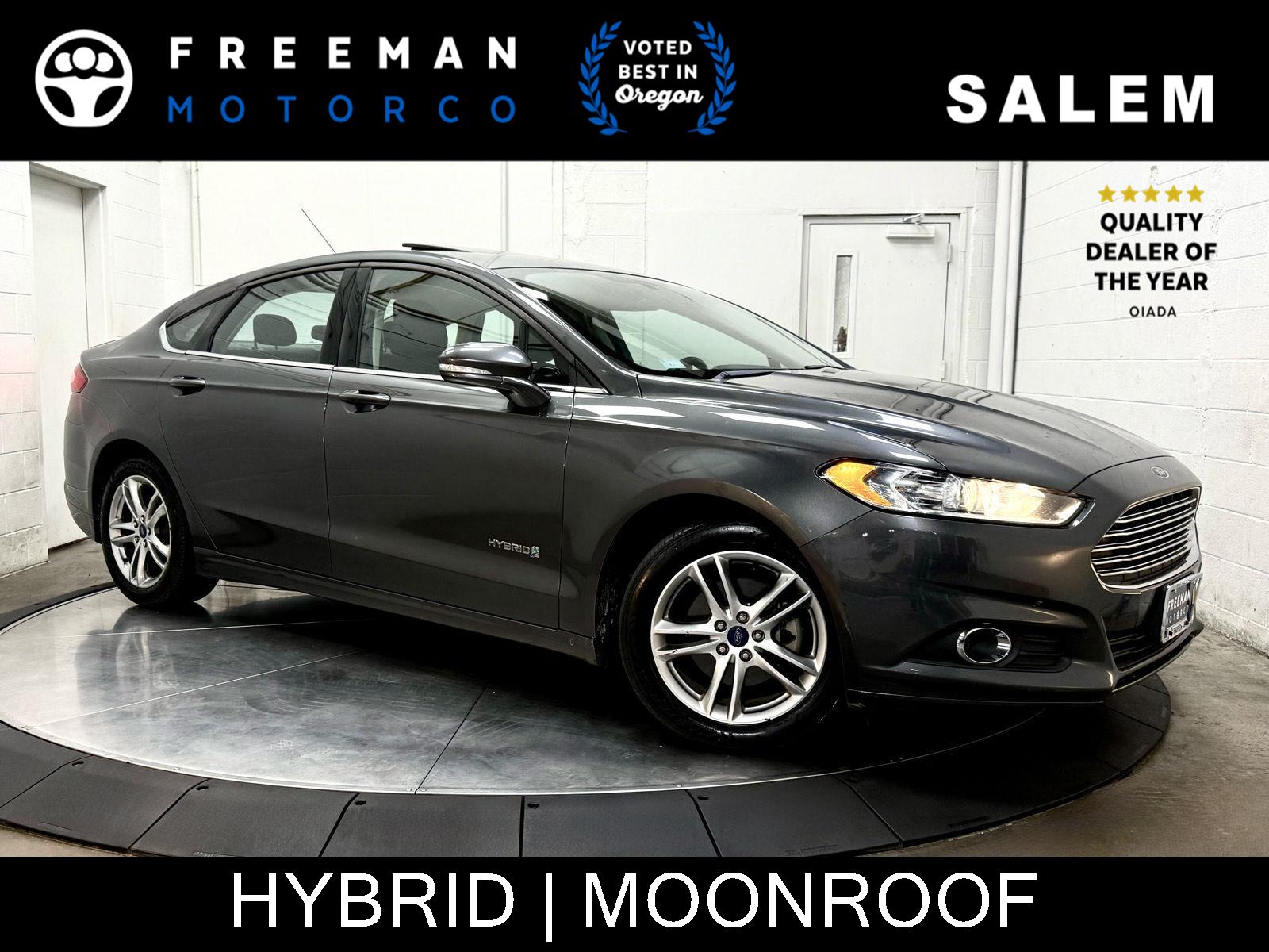Gray (Magnetic) 2016 Ford Fusion Hybrid Sedan Front-Wheel Drive Continuously Variable Transmission