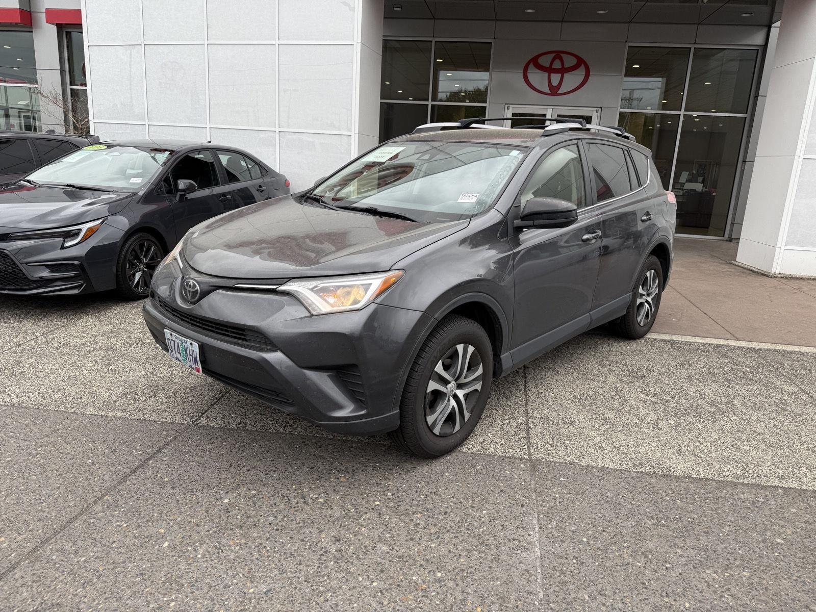 Certified 2018 Toyota RAV4 LE with VIN JTMBFREV9JJ183040 for sale in Gladstone, OR