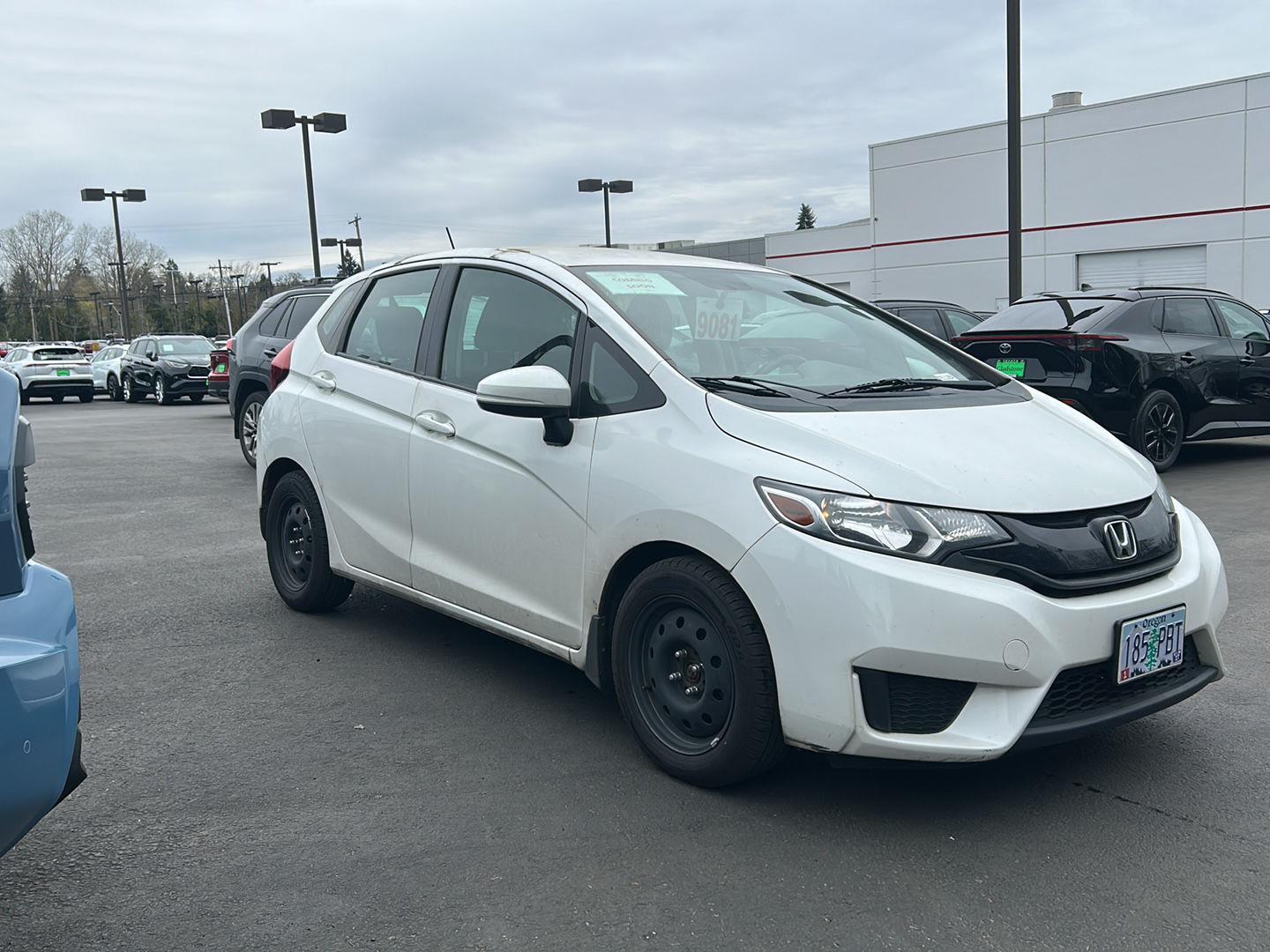White Orchid Pearl 2015 Honda Fit LX Hatchback Front-Wheel Drive Continuously Variable Transmission