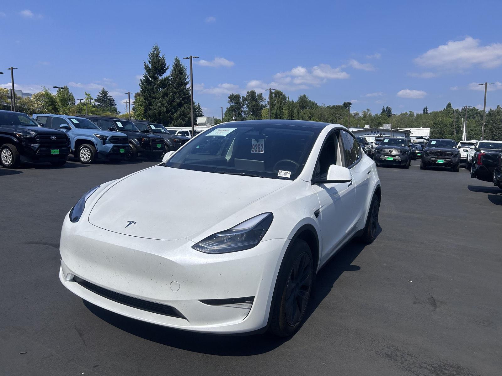 Solid Black 2024 Tesla Model Y SUV / Crossover All-Wheel Drive Automatic
