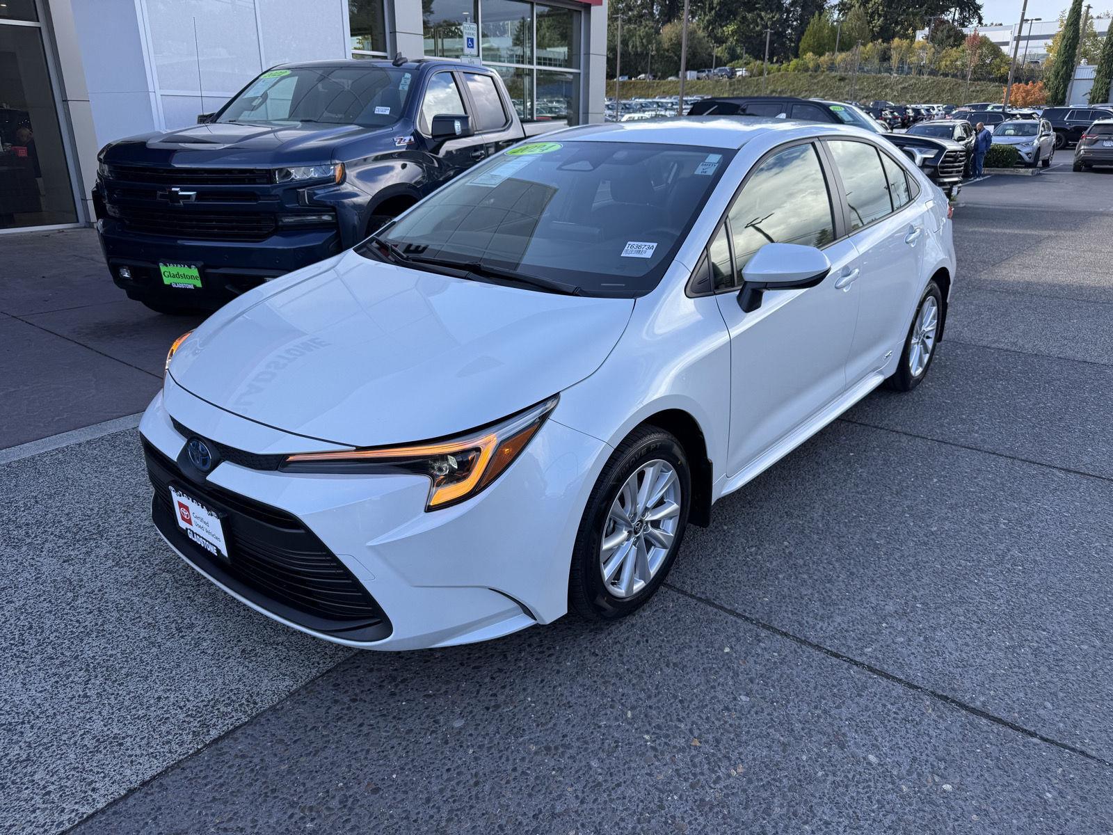 White (Wind Chill Pearl) 2024 Toyota Corolla Hybrid Sedan All-Wheel Drive Continuously Variable Transmission