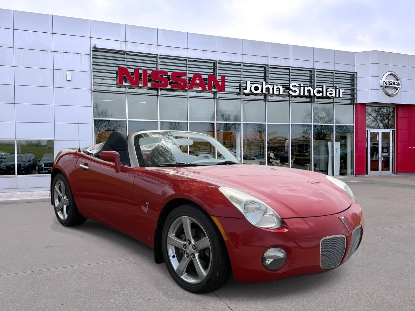 Aggressive Victory Red 2006 Pontiac Solstice Roadster Convertible Rear-Wheel Drive 5-Speed Manual