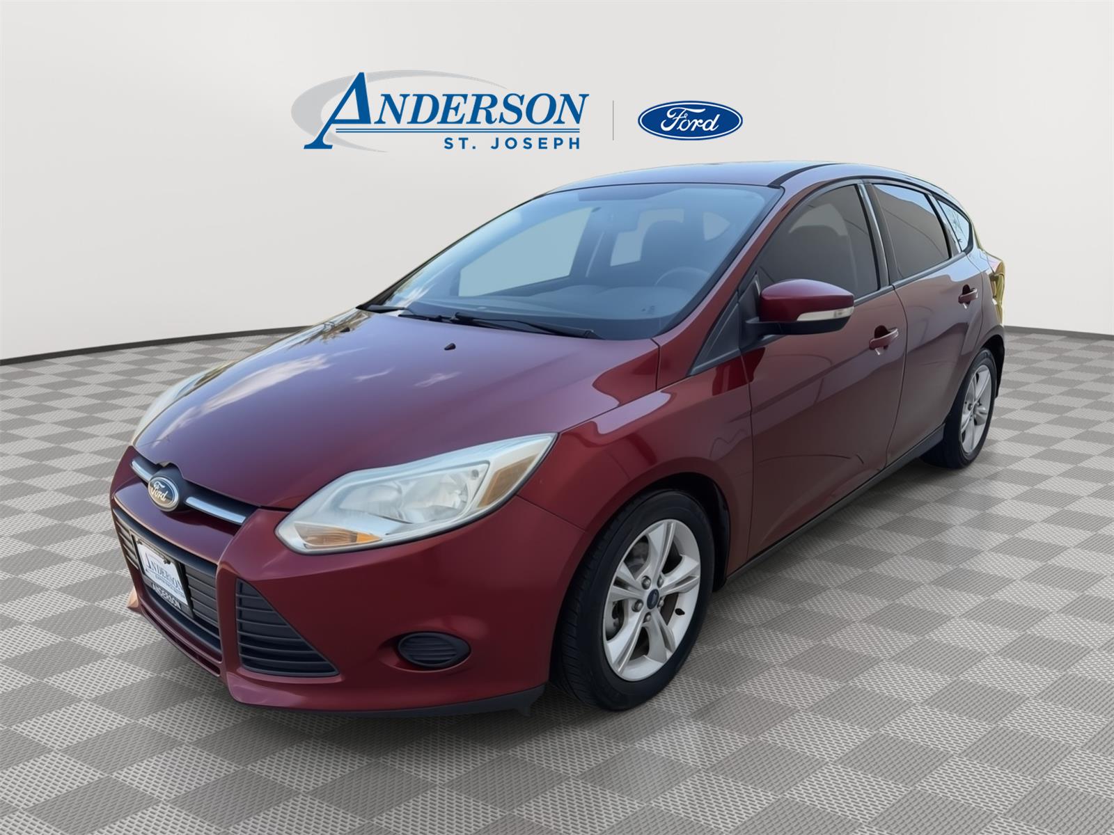 Ruby Red Metallic Tinted Clearcoat 2014 Ford Focus Hatchback Front-Wheel Drive 5-Speed Manual