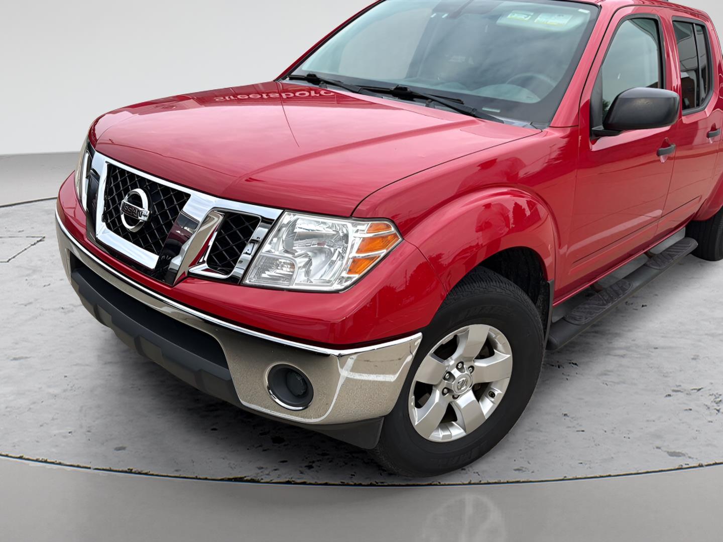 Red Alert 2010 Nissan Frontier Pickup Truck Four-Wheel Drive Automatic
