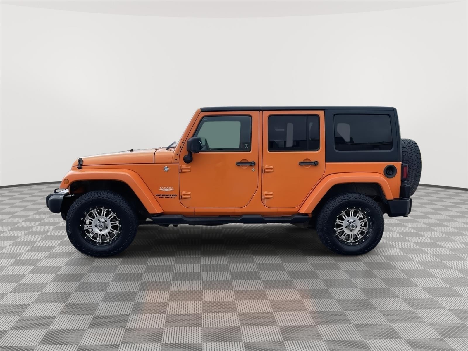 Used 2012 Jeep Wrangler Unlimited Sahara SUV for sale in Grand Island NE