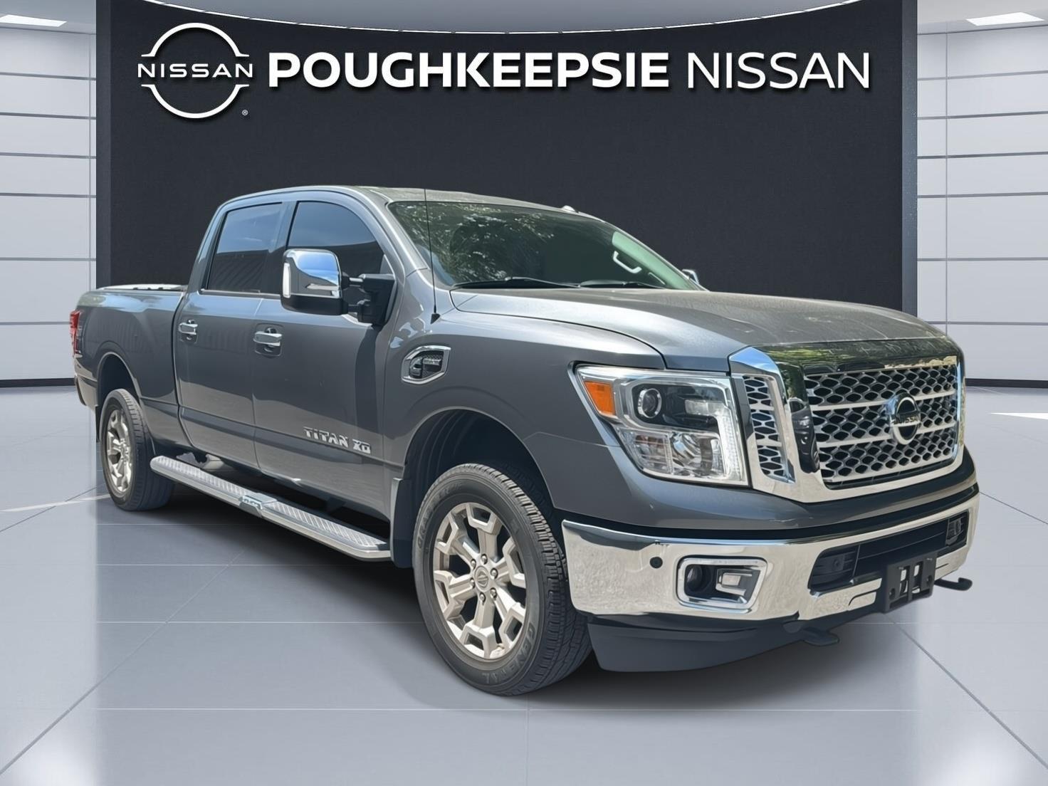 Gray (Gun Metallic) 2016 Nissan Titan Pickup Truck Four-Wheel Drive Automatic
