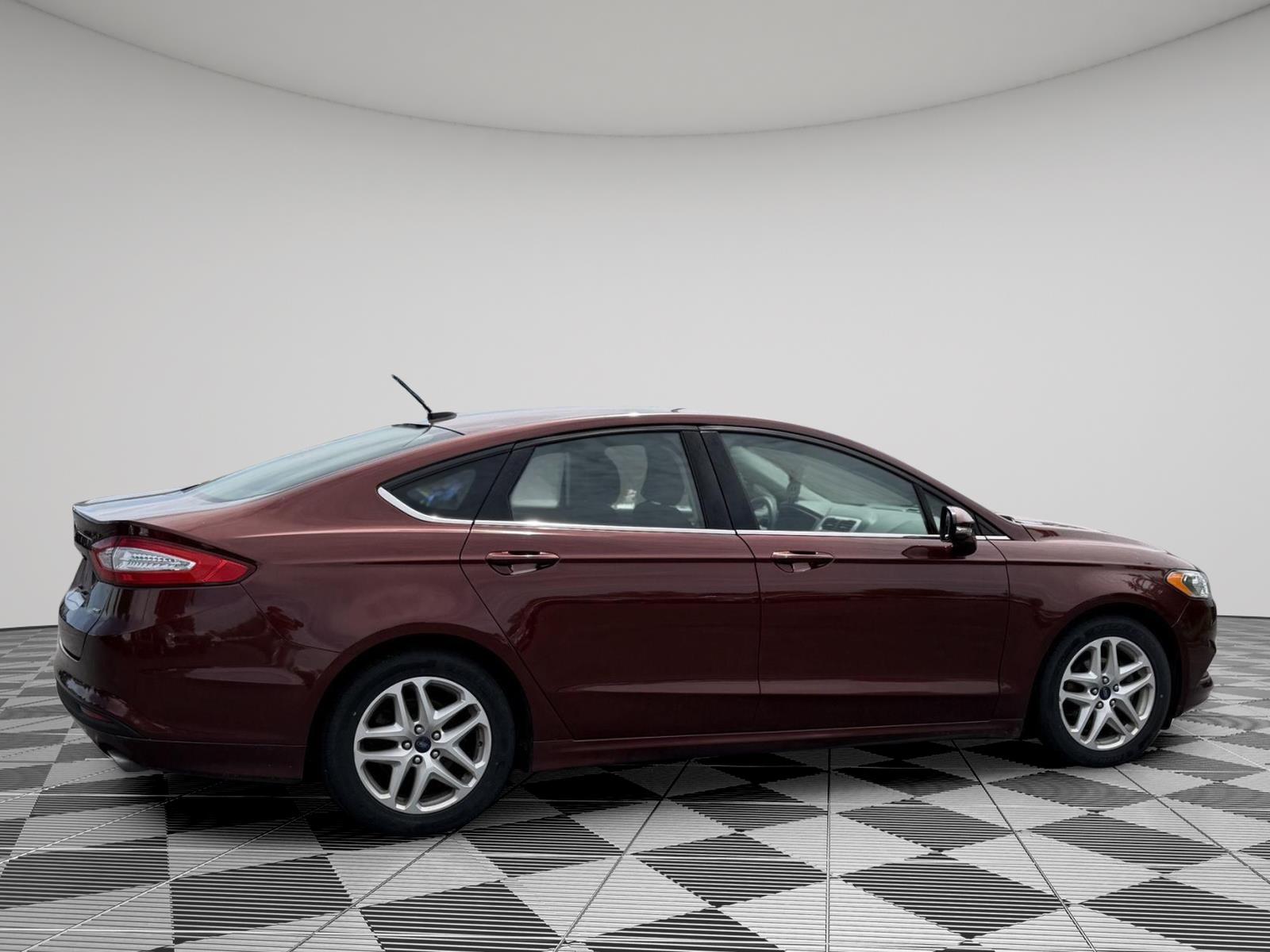 Used 2016 Bronze Fire Metallic Tinted Clearcoat Ford SE image 4