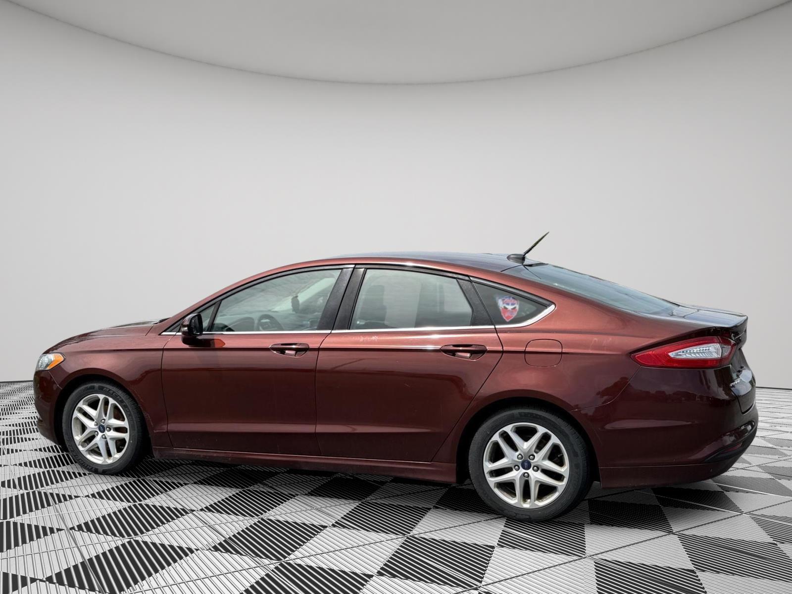 Used 2016 Bronze Fire Metallic Tinted Clearcoat Ford SE image 5