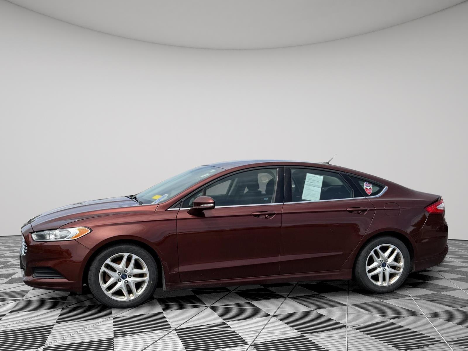 Used 2016 Bronze Fire Metallic Tinted Clearcoat Ford SE image 6