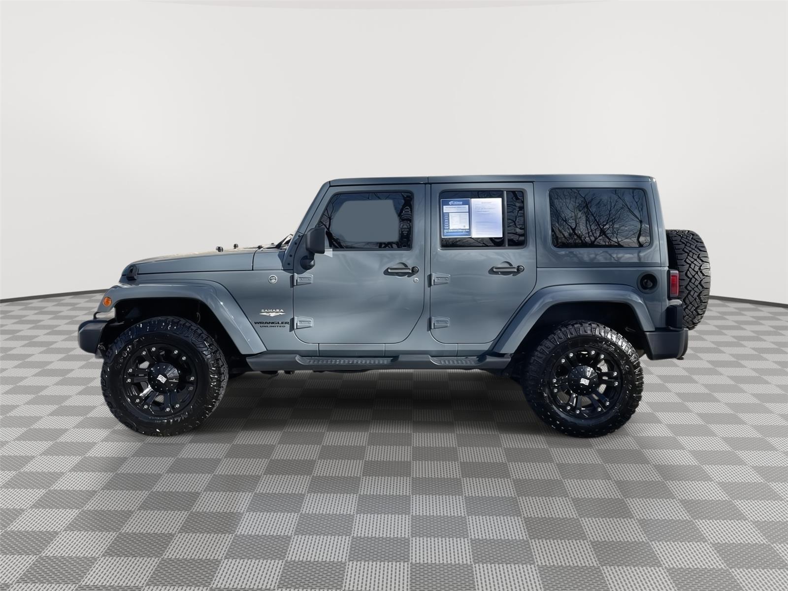 Pre-Owned 2014 Jeep Wrangler Unlimited for sale in Lincoln NE