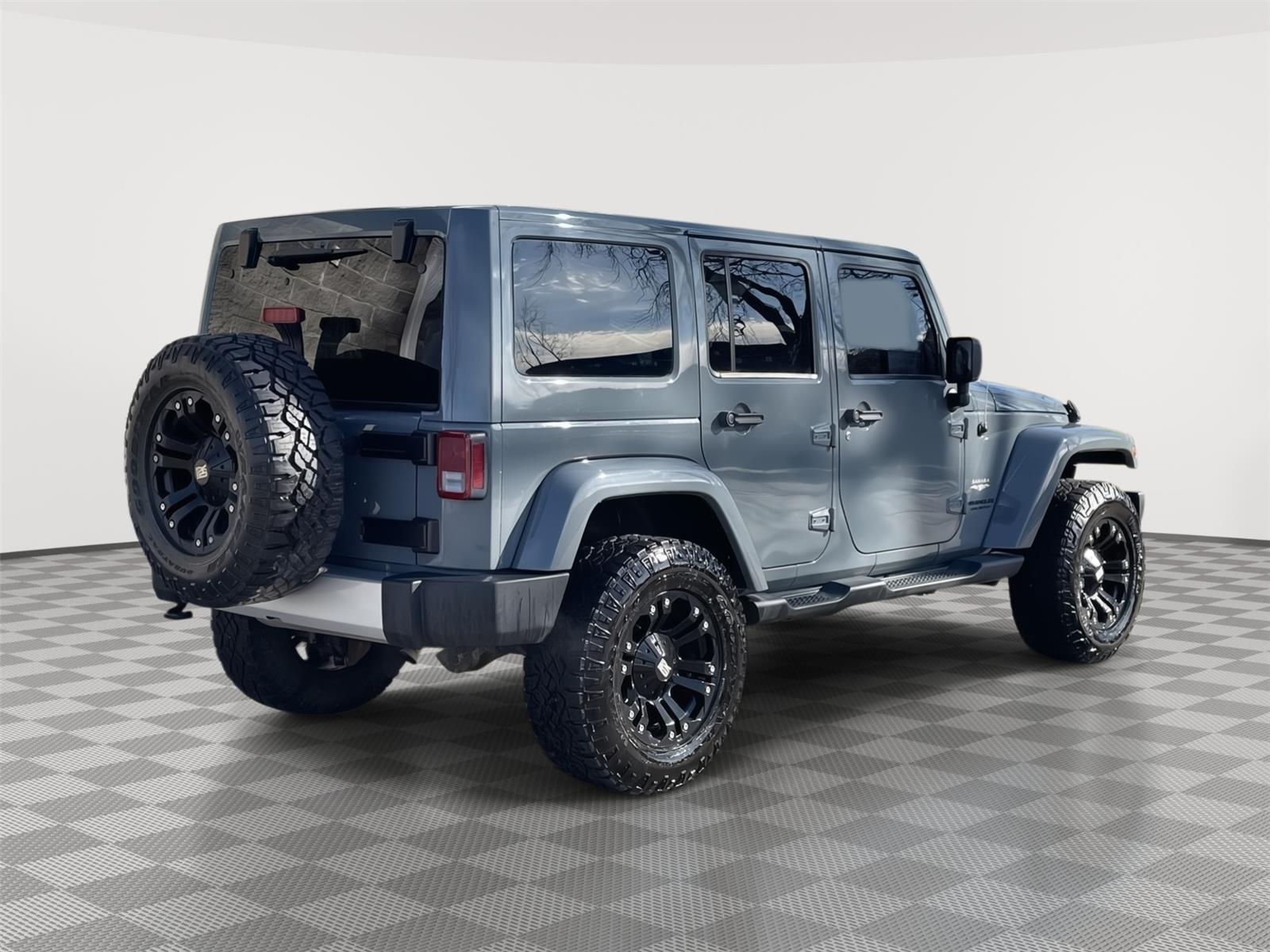 Pre-Owned 2014 Jeep Wrangler Unlimited for sale in Lincoln NE
