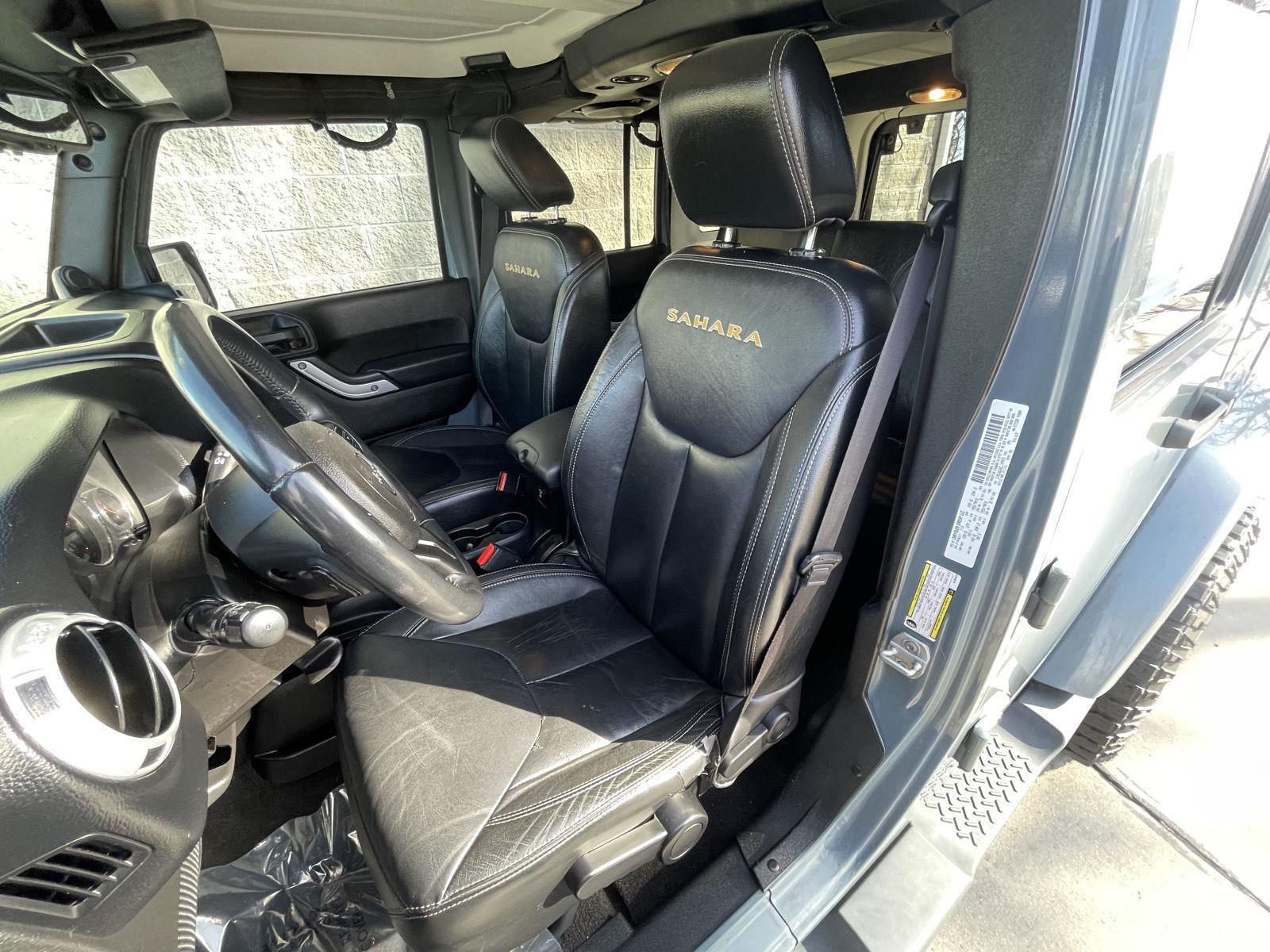 Pre-Owned 2014 Jeep Wrangler Unlimited for sale in Lincoln NE