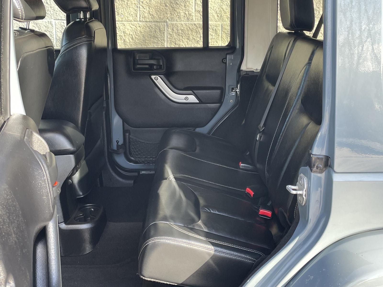 Pre-Owned 2014 Jeep Wrangler Unlimited for sale in Lincoln NE