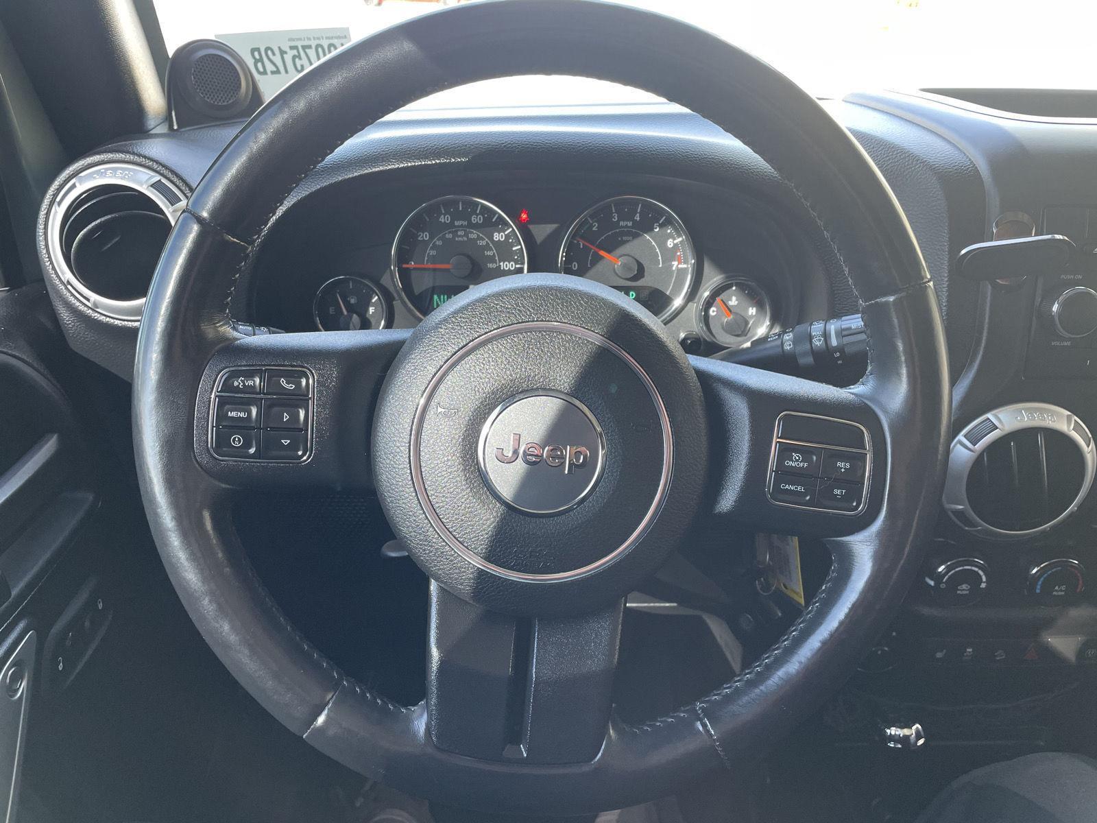 Pre-Owned 2014 Jeep Wrangler Unlimited for sale in Lincoln NE