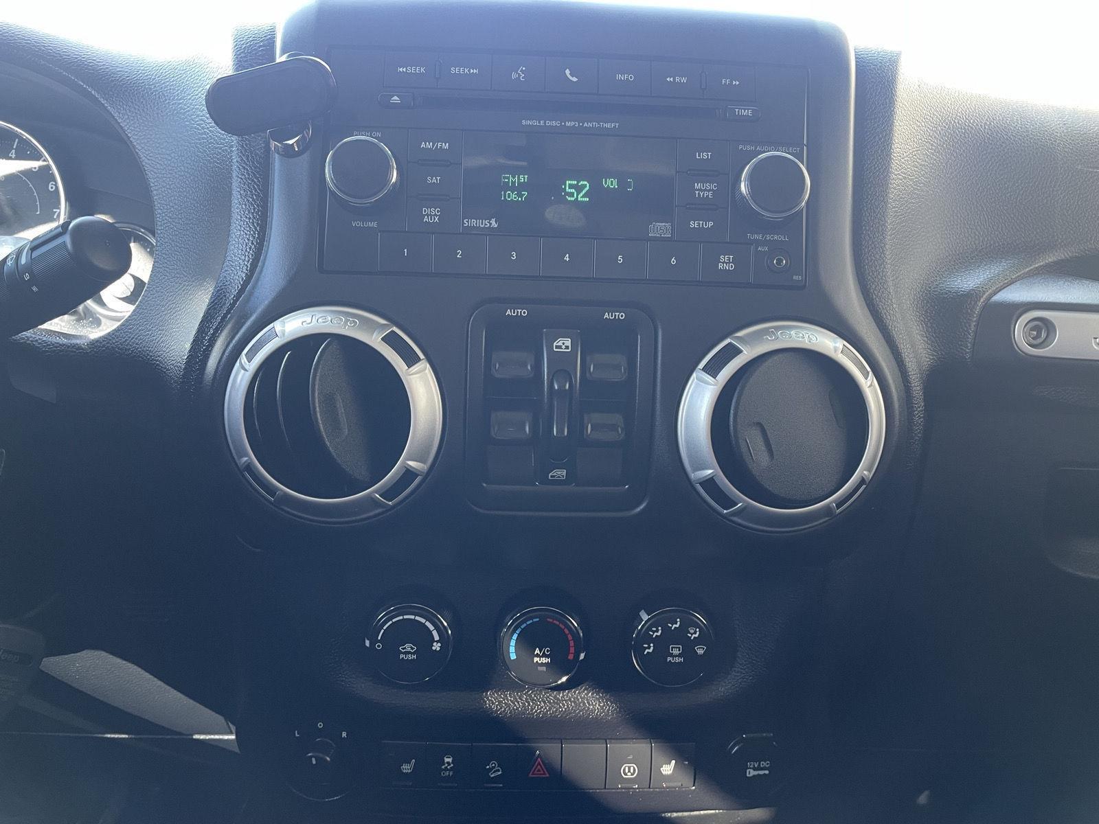 Pre-Owned 2014 Jeep Wrangler Unlimited for sale in Lincoln NE