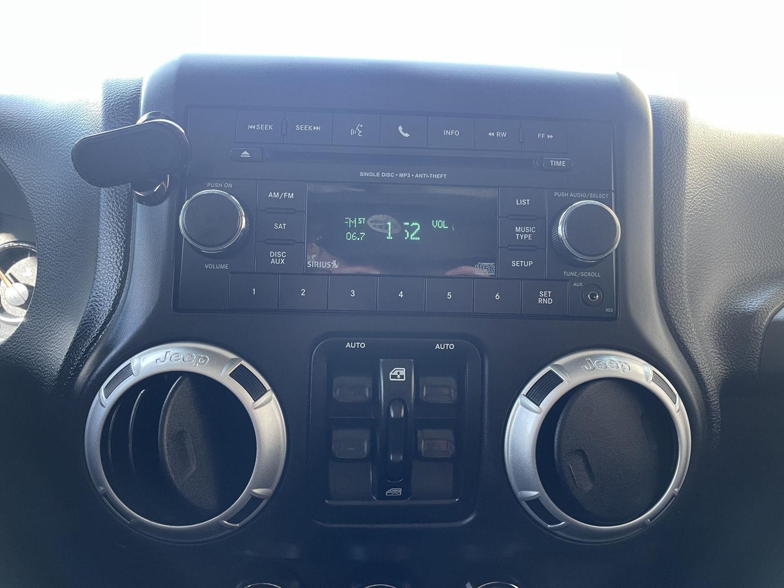 Pre-Owned 2014 Jeep Wrangler Unlimited for sale in Lincoln NE